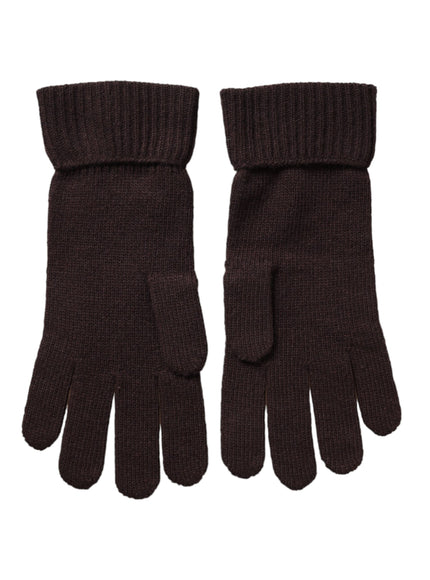 a pair of brown gloves on a white background