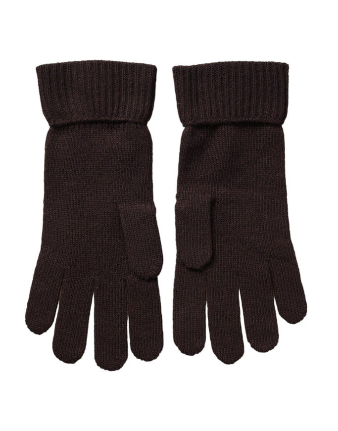 a pair of brown gloves on a white background