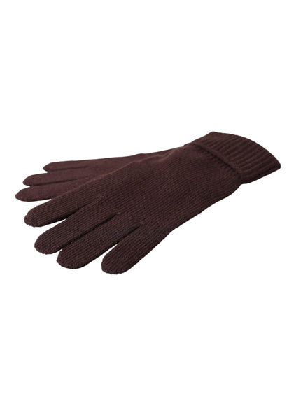 a pair of brown gloves on a white background