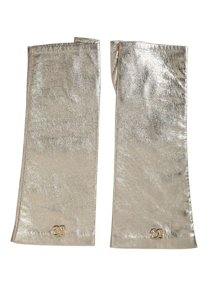 a pair of metallic gloves on a white background