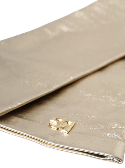 a close up of a gold cloth on a white background