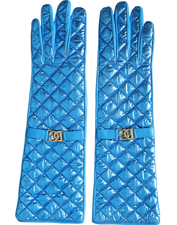 a pair of blue gloves with a gold buckle