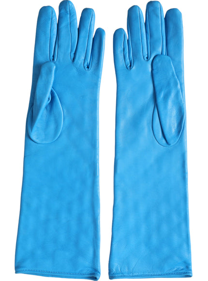 a pair of blue leather gloves on a white background