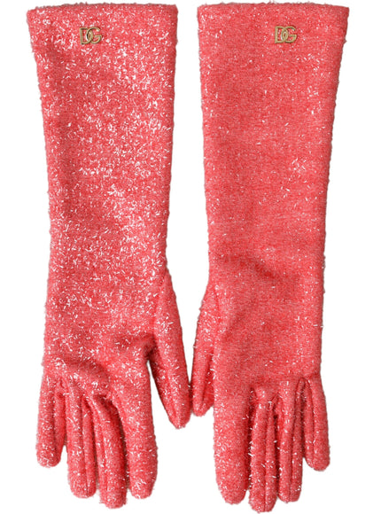 a pair of pink gloves with gold buttons