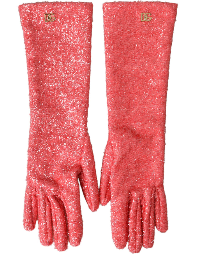 a pair of pink gloves with gold buttons