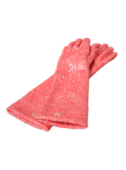 a pair of pink glitter gloves on a white background