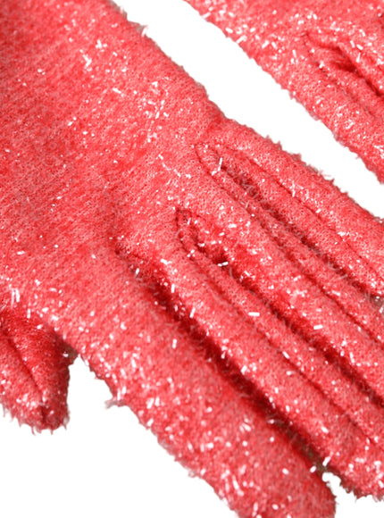 a close up of a pair of red glitter gloves