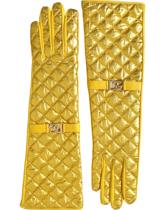 a pair of yellow leather gloves with buckles