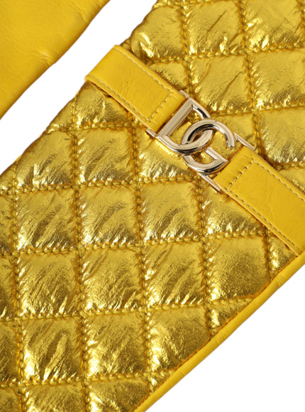 a close up of a gold purse on a white background