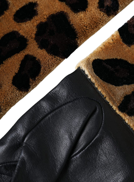 a pair of black leather gloves with a leopard print pattern