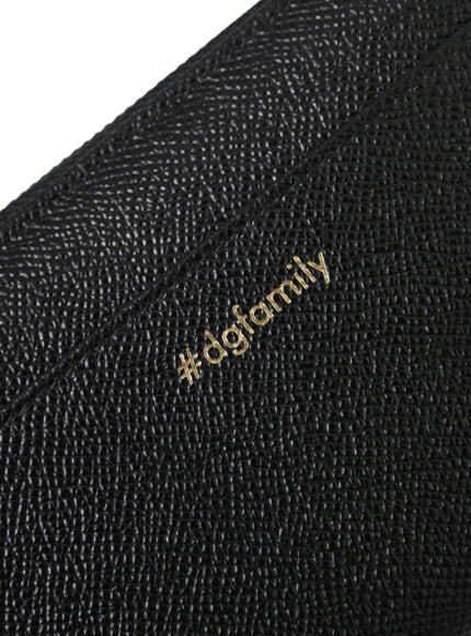 a close up of a black wallet with a gold logo