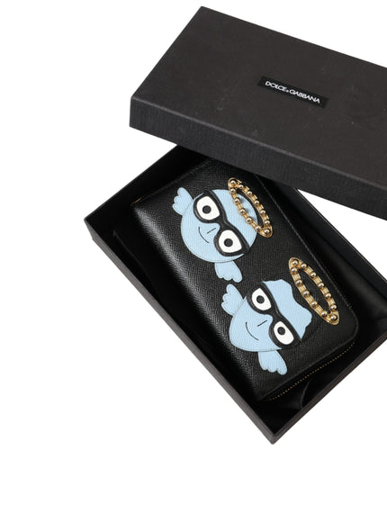 a black wallet with a blue cartoon character on it