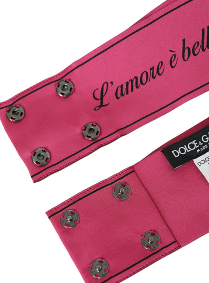 Pink belt with snap buttons and Dolce & Gabbana label