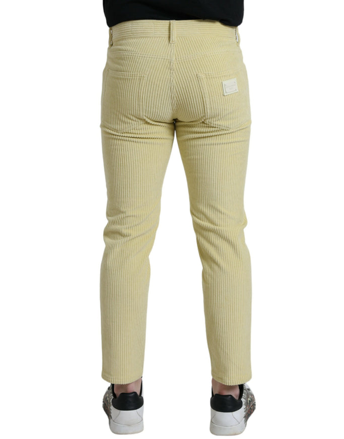 Back view of Dolce & Gabbana yellow corduroy skinny jeans