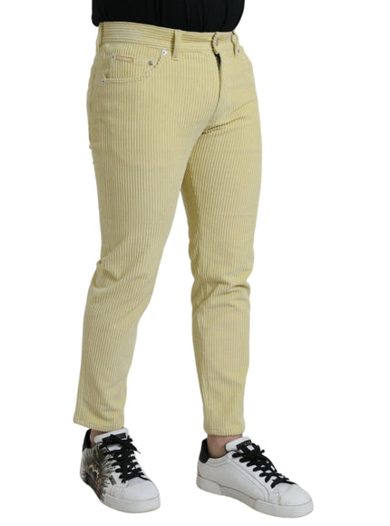 Side view of Dolce & Gabbana yellow corduroy skinny jeans