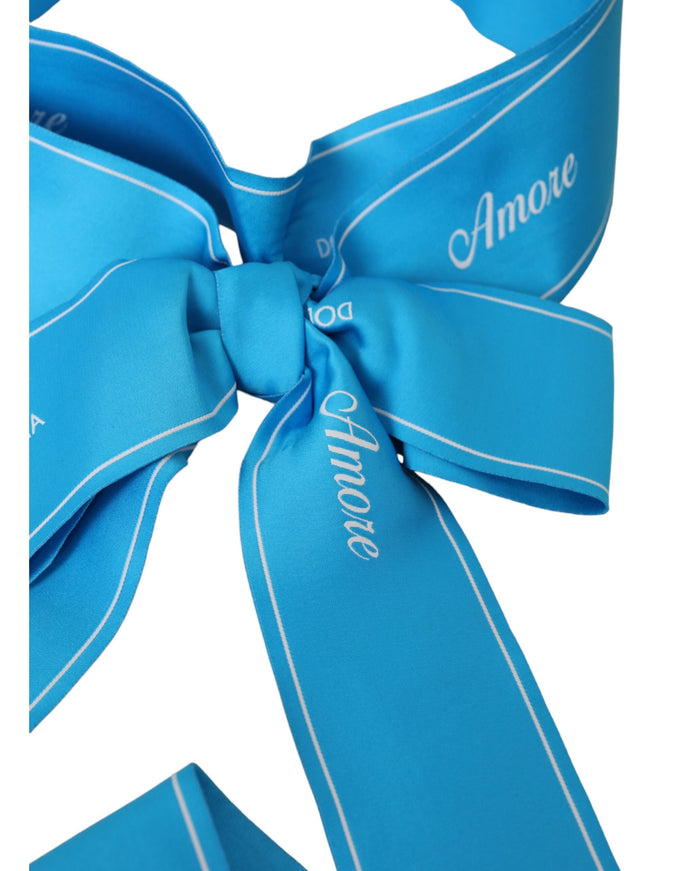 Close-up of blue AMORE waist belt bow detail