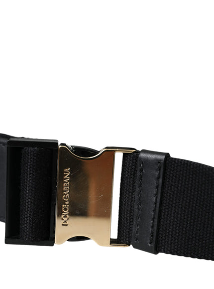 a black belt with a gold buckle on it