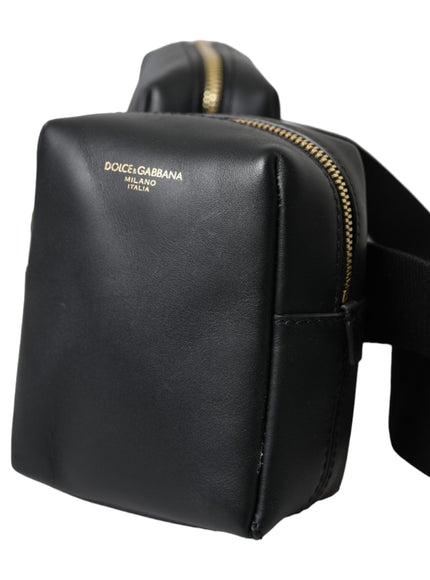 a black purse with a gold zipper