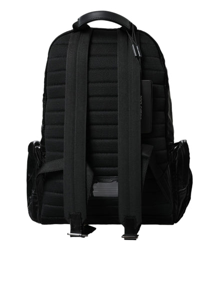 a black backpack with a zipper on the front