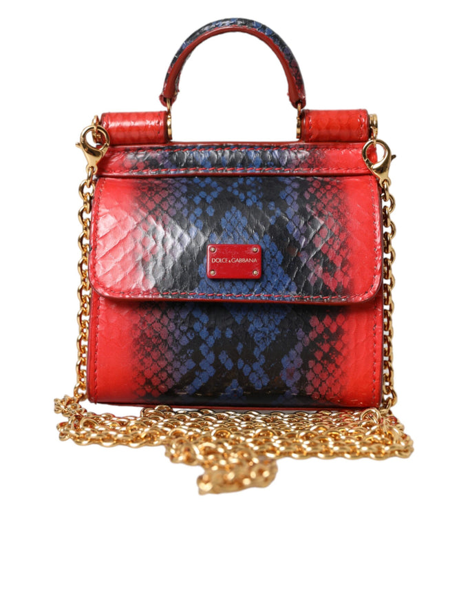 a red, blue and black handbag on a chain