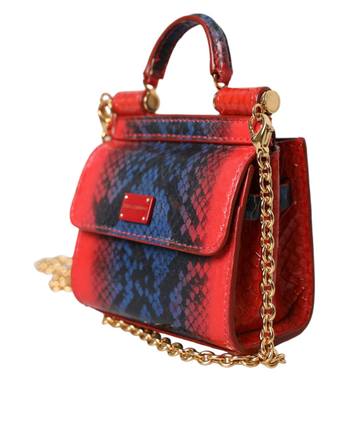 a red, blue, and black handbag on a chain