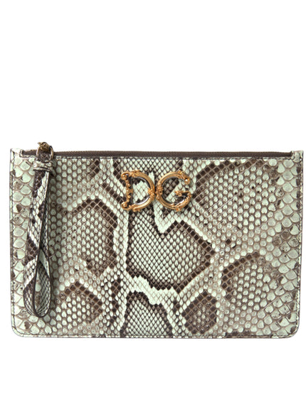 a purse with a snake skin pattern and gold hardware