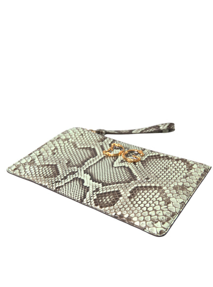 a snake skin purse with a gold chain