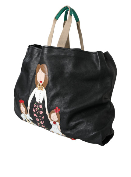 a black bag with a picture of a woman and a child on it