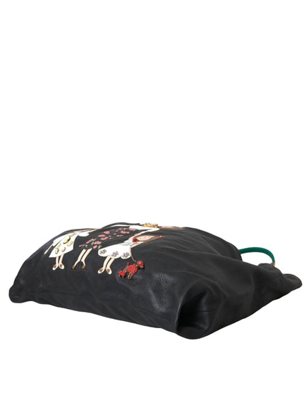 a black bag with a picture of horses on it