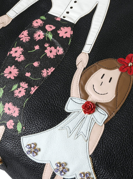 a handbag with a picture of a girl on it