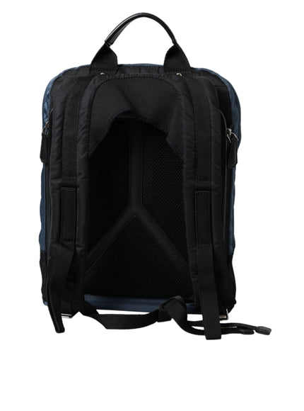 the back of a black backpack with a zipper