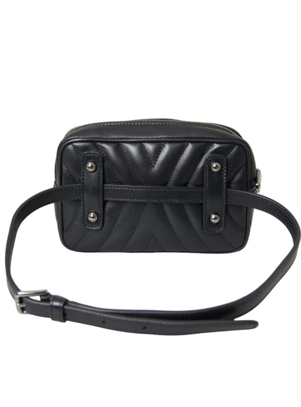 a black cross body bag on a white background