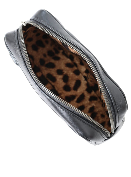 a black purse with a leopard print lining