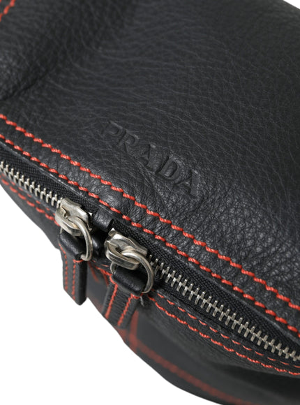 a black leather case with red stitching and zippers