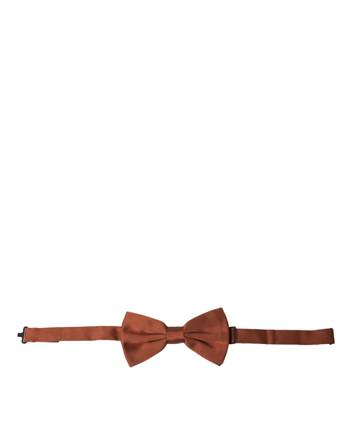 a brown bow tie on a white background