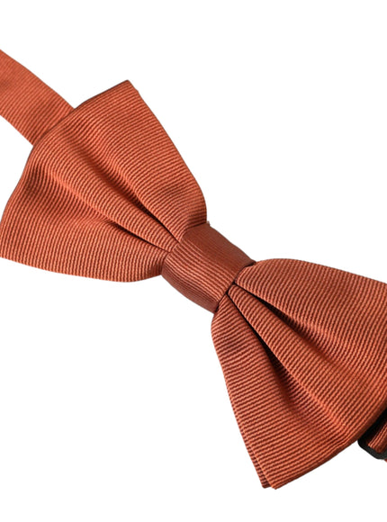 a close up of a bow tie on a white background