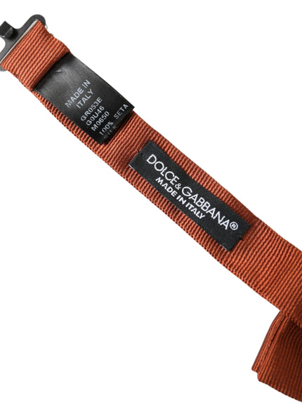 a red belt with a black tag on it