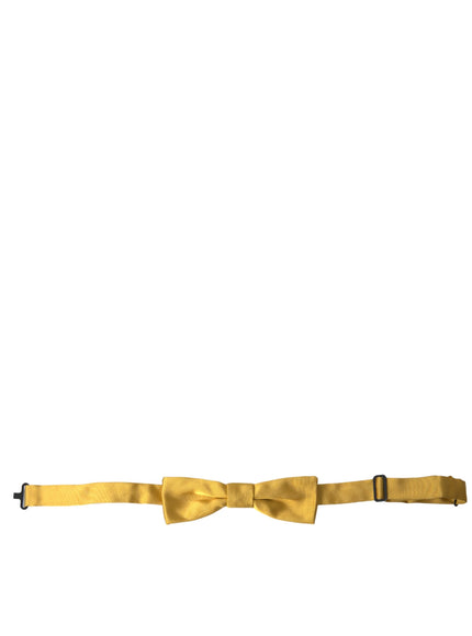 a yellow bow tie on a white background