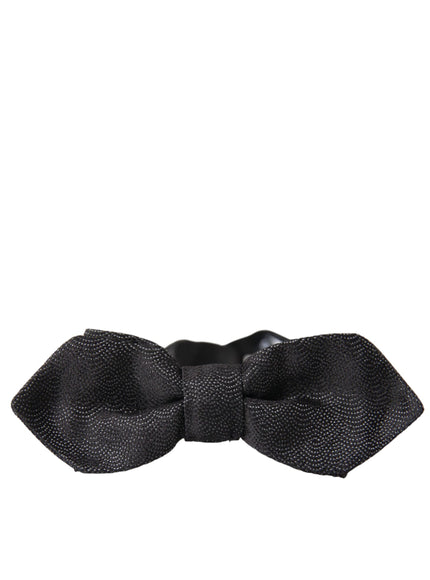 a black bow tie on a white background