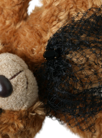 Detail of black lace on Dolce & Gabbana teddy bear hair band