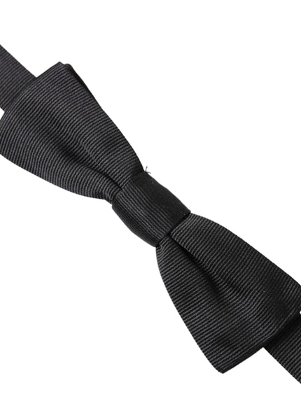 a black bow tie on a white background