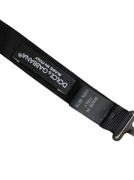 a black belt with a metal buckle on it