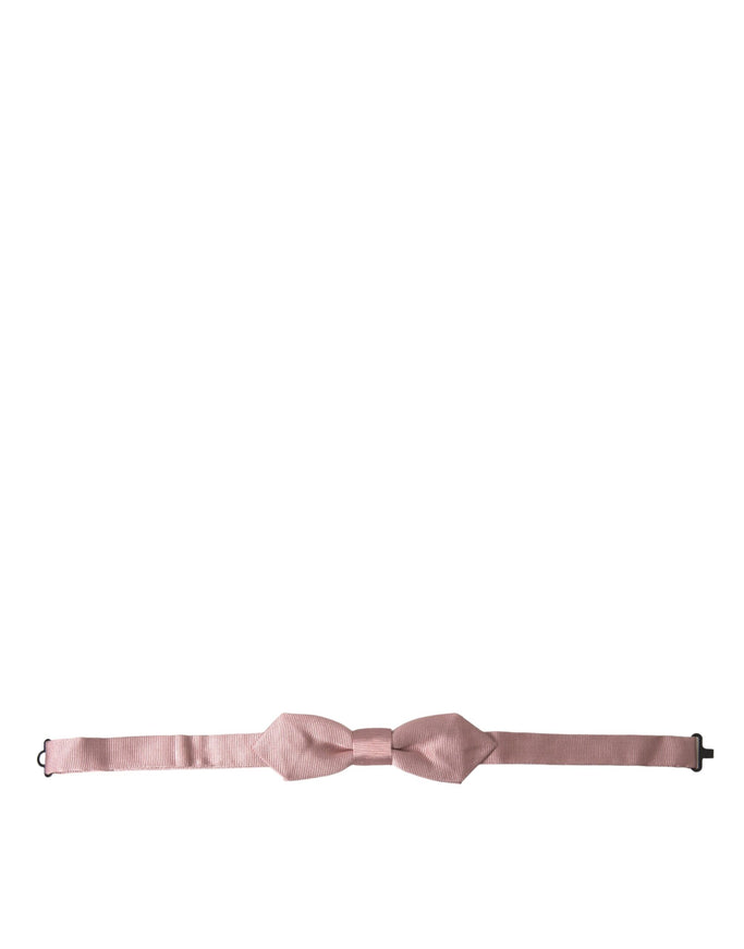 a pink bow tie on a white background