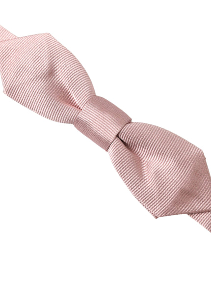 a pink bow tie on a white background