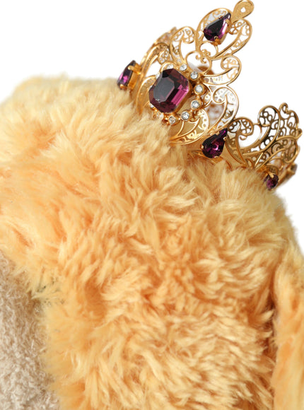 Close-up of gold crystal crown on teddy bear hair band