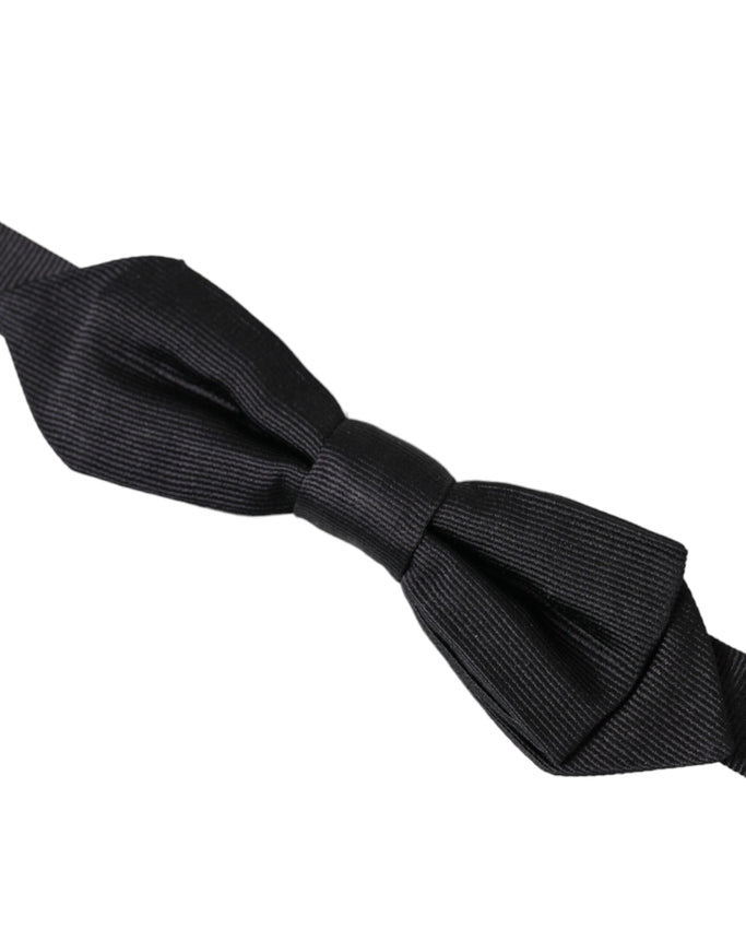 a black bow tie on a white background