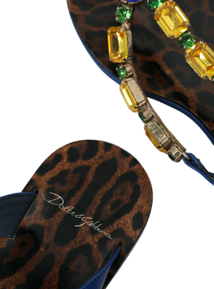 a pair of leopard print sandals with green and yellow beads