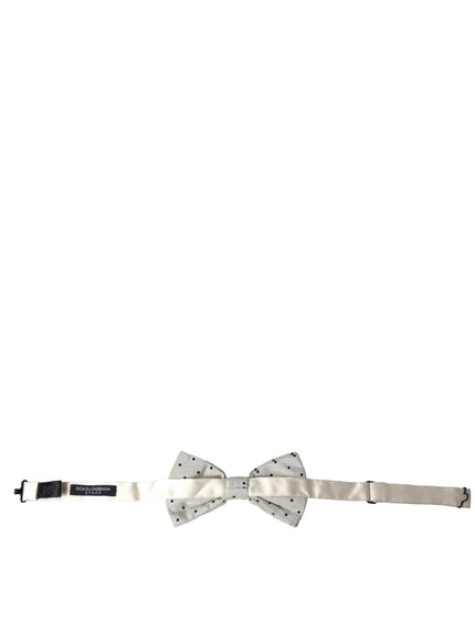 a white bow tie and a black tie on a white background