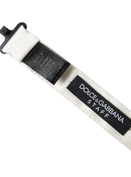 a black and white label on a white strap