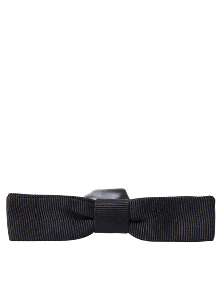 a black bow tie on a white background